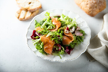 Healthy green salad with smoked salmon