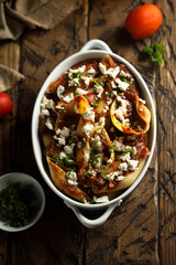 Homemade pasta bake with tomato sauce and cheese