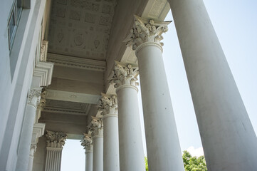 Fototapeta premium Beautiful classic facade of a building with columns in Europe