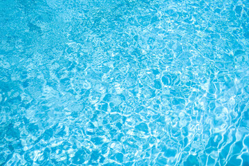 Ripple blue water in the pool background 