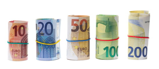 Money rolls, rolled up euro banknotes, bills of various monetary values tied up with rubber band isolated on white background