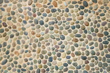 Pebbles stone wall or floor background