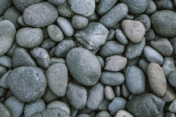 Fototapeta na wymiar Pebbles stone or river stone background with vintage filter 