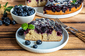 Piece of homemade blueberry pie on the plate.