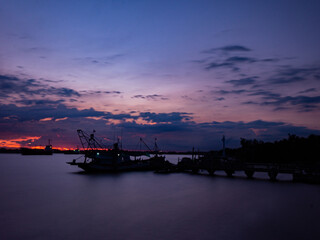 Take a photo on twilight time at harbor of Samut Sakhon Province Thailand.