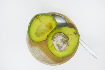 Ripe avocados to make juice. Isolated on white background 