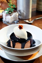  A Bowl Of Chocolate Ice Cream And Vanilla Ice Cream