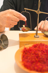 Weighing of saffron, Franco Sanna, San Gavino, Cagliari, Sardinia, Italy