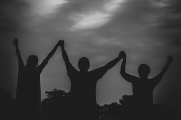 silhouette of people(friends) celebrating