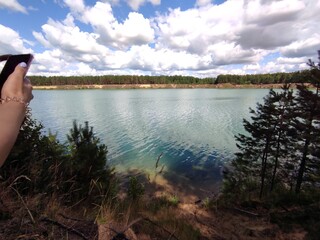 Turquoise color of the water in the reservoir. Lake. River. Nature. Landscape.