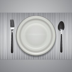 a plate with a fork and spoon