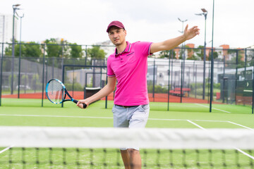 Male tennis player on the tennis court