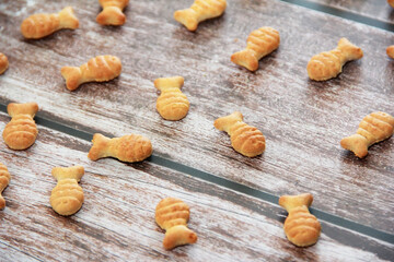 edible dry cookies in the shape of a fish