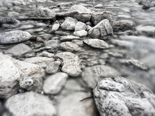 Water flowing in the stony river bed of an alpine mountain stream, Germany