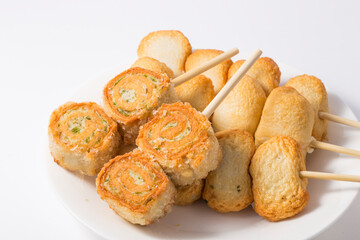 Fish cake skewer, isolated on white background.