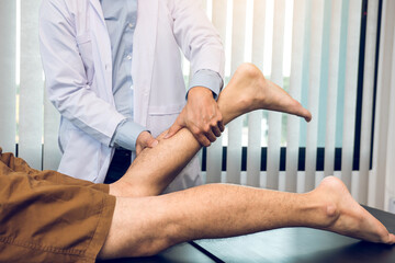 Physical therapists use their hands to check the calf muscles.