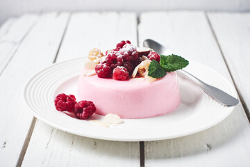 Raspberry panna cotta dessert.