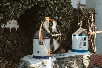 Small windmills in an amusement park in Aldeia Jose Franco, Mafra, Portugal