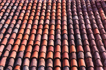 Closeup of old roof tiles partially replaced by new ones in Hvar, Dalmatia, Croatia
