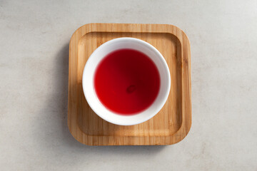 Schizandra tea. Top view. Traditional Korean drink is brewed from Chinese lemongrass used in alternative medicine