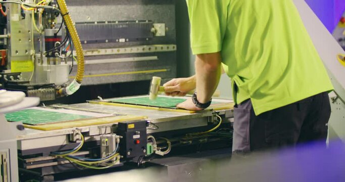 Electronic factory caucasian worker prepair for manufacture printed circuit board PCB.