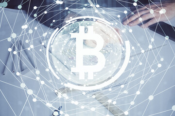 Man's hands working with notes background. Cryptocurrency and finance concept.