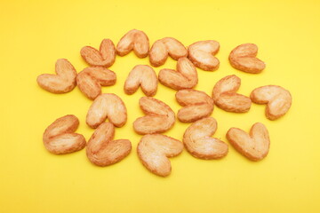 butter cookies on yellow background