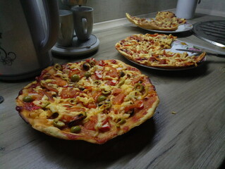 homemade pizza on the kitchen table