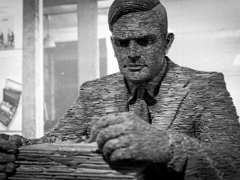 London, England - June 21, 2015: Slate statue of Mathematician Alan Turing at Bletchley Park, Bletchley, Milton Keynes, Britain