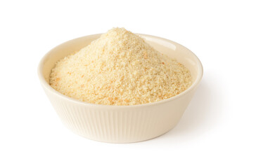 Wheat bread crumbs in a beige ceramic bowl isolated on white background. Ingredient for meatballs and cutlets. Cook at home.