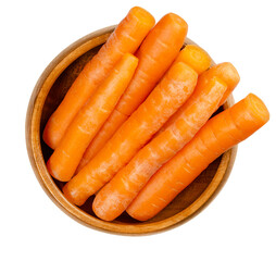 Snack carrots in a wooden bowl. Crunchy and fresh, unpeeled, small and young carrots, ready-to-eat. Edible, raw, organic and vegan. Close-up from above, on white background, isolated macro food photo.