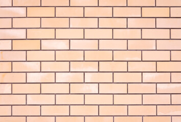 Obraz premium Beige new brick wall. Smooth, smooth brick. Structure. Backdrop. Texture. 