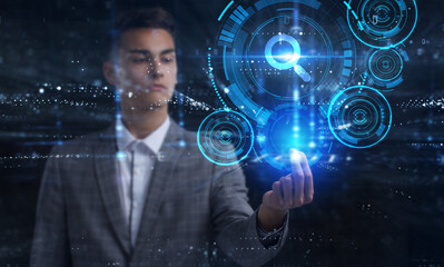 Business, Technology, Internet and network concept. Young businessman working on a virtual screen of the future and sees the inscription: