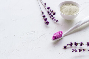 Fototapeta premium Herbal organic tooth powder with toothbrush close up