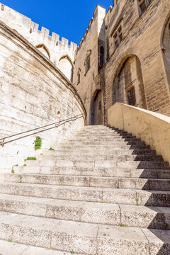 Avignon - France. July 04, 2020: Main staircase of Palace of the Popes in Avignon city (Vertical photo)