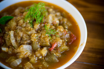Eggplant caviar in the rustic bowl closeup