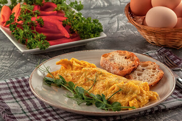 Fresh French omelet with fresh vegetables. Vegetarian food