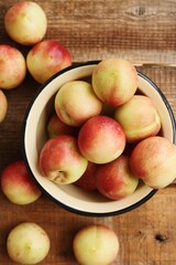 Juicy nectarines on a wooden table macro