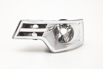 car spare part headlights on white background