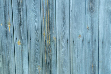 Close-up of old worn blue vertical wood panels, stripes, wood Texture