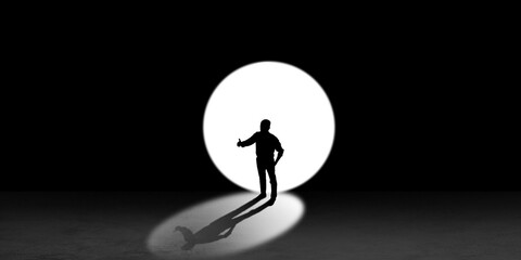 Silhouette of man walking in the night toward the light, view from above. Way of life, going...