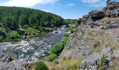 Stone boulders in a mountain river