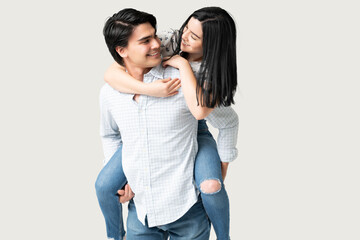 Young Hispanic Couple Having Fun Together