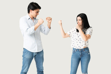 Angry Couple Standing With Fist Defense Gesture