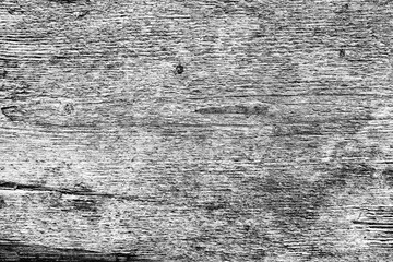 Wooden texture with scratches and cracks. It can be used as a background