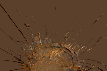 broken mirror glass on a colored and black background in cracks in the form of an isolated image...