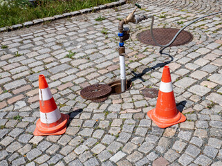 traffic cones on the street Water pipes