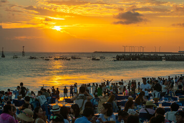 Sunset time at Jimbaran Bay in the Island of Bali, Indonesia, before Pandemic. 