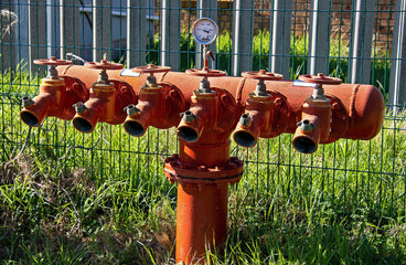 Red Fire hydrants with many outlet pipes