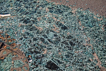 shattered glass on the road